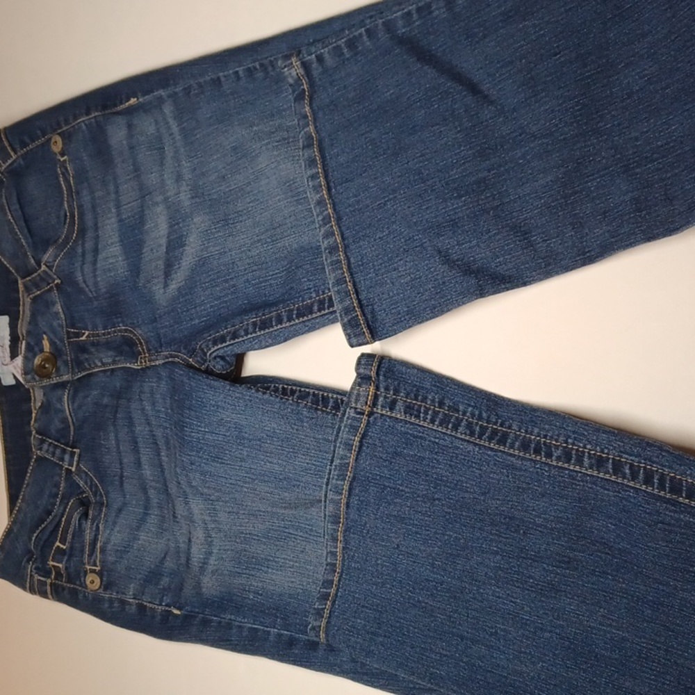 Candie's jeans size 9 with 8" wide legs denim is medium to dark colored